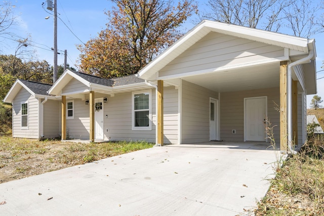 view of front of home featuring a carport