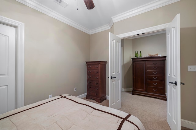 bedroom featuring light carpet, ornamental molding, and ceiling fan