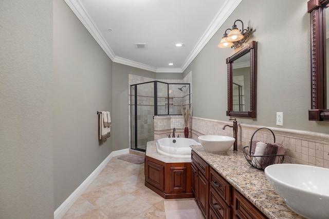 bathroom with a shower with door, vanity, crown molding, and tile patterned flooring