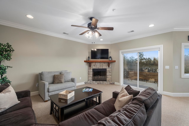 living room featuring a stone fireplace, carpet, and ornamental molding