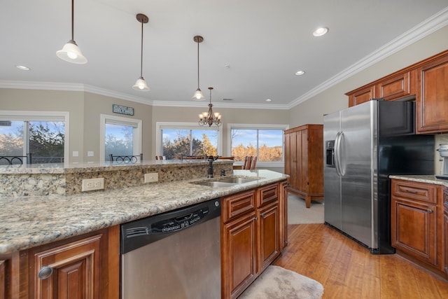 kitchen featuring light stone countertops, appliances with stainless steel finishes, sink, crown molding, and light hardwood / wood-style flooring