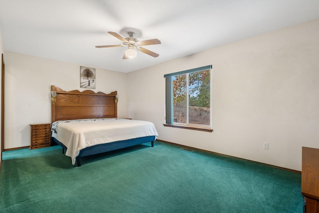 carpeted bedroom featuring ceiling fan