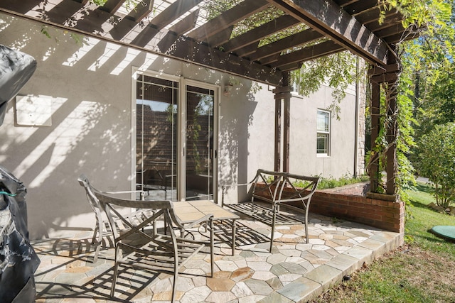 view of patio / terrace featuring a pergola