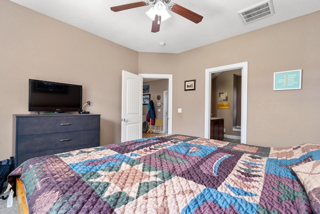 bedroom featuring connected bathroom and ceiling fan