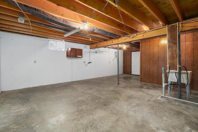 basement with wood walls