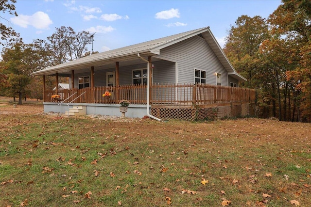 view of front of property with a porch and a front yard