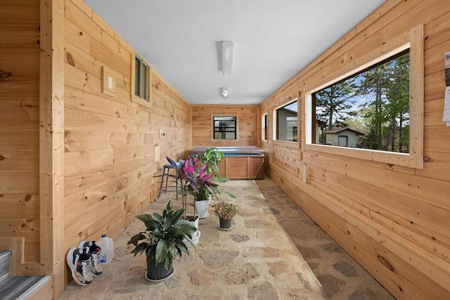 interior space featuring wood walls