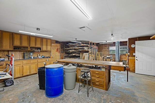 interior space featuring a workshop area