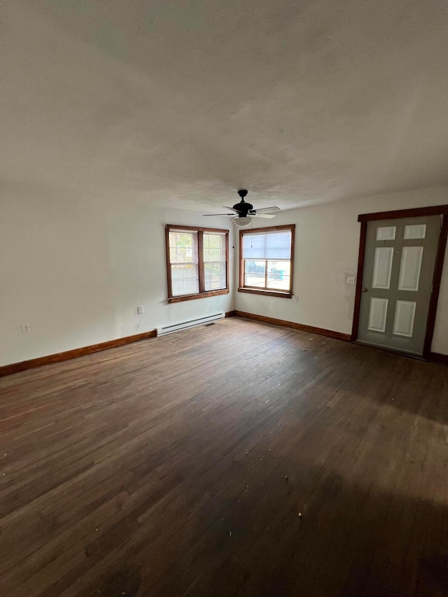 unfurnished room featuring ceiling fan, hardwood / wood-style flooring, and baseboard heating