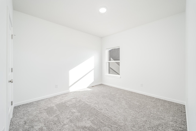 spare room with carpet flooring