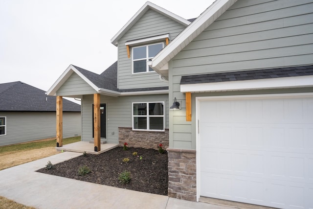 craftsman inspired home featuring covered porch