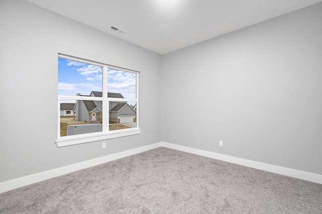 view of carpeted spare room