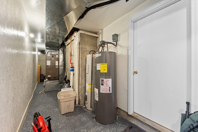 utility room featuring water heater and heating unit