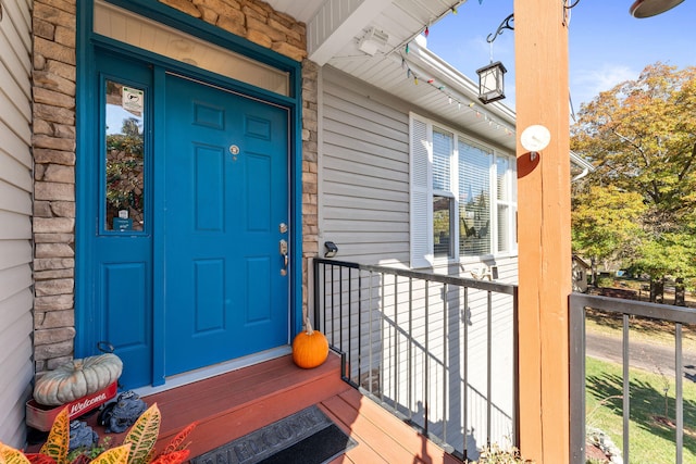 doorway to property featuring a porch