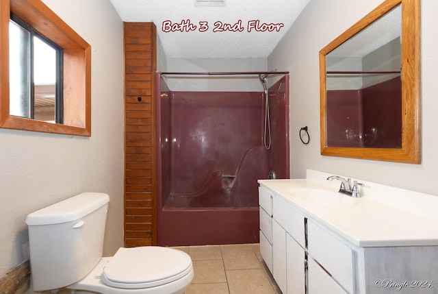 full bathroom featuring a textured ceiling, toilet, shower / tub combination, vanity, and tile patterned flooring