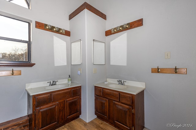 bathroom featuring vanity and hardwood / wood-style flooring