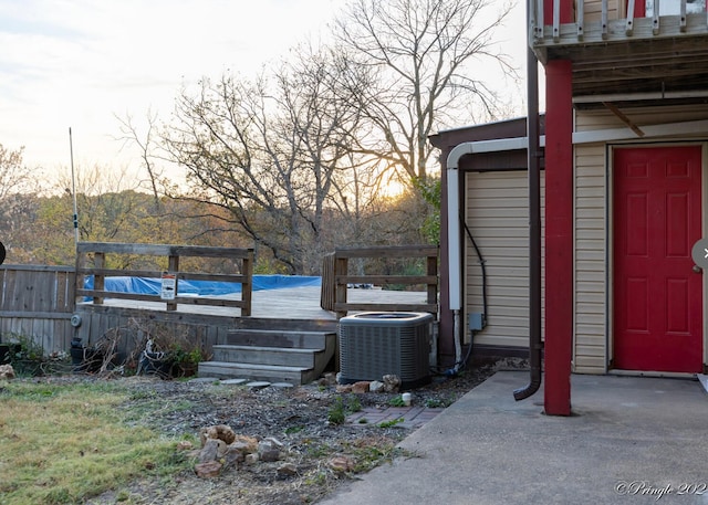 exterior space featuring a deck and central AC unit