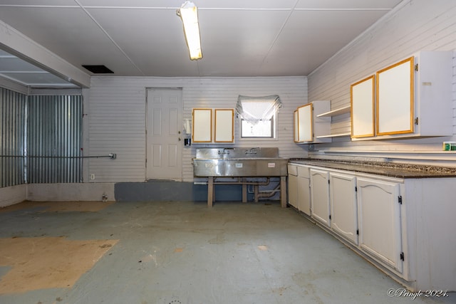 interior space featuring white cabinetry