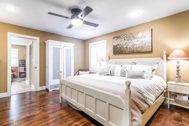 bedroom featuring dark wood-type flooring and ceiling fan