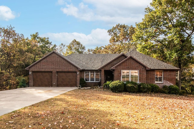 ranch-style home with a garage