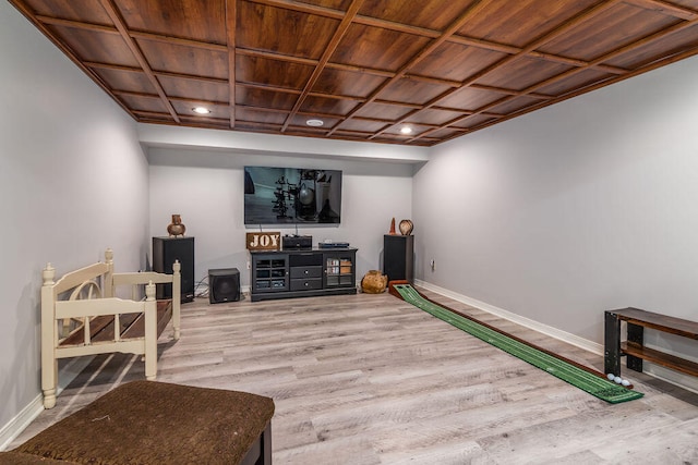 living area featuring light hardwood / wood-style flooring and wooden ceiling