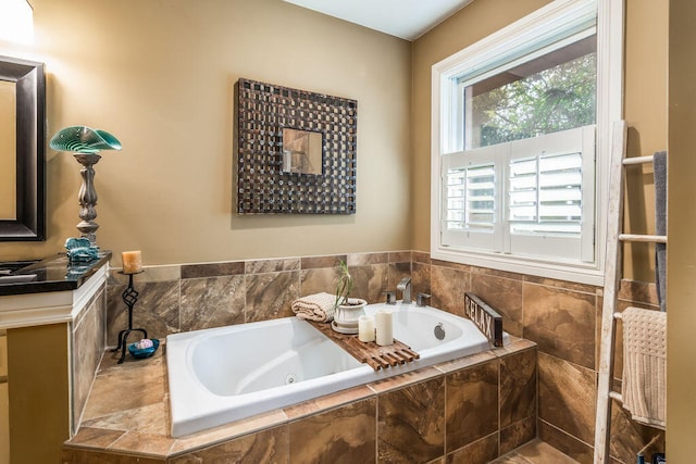 bathroom with tiled bath