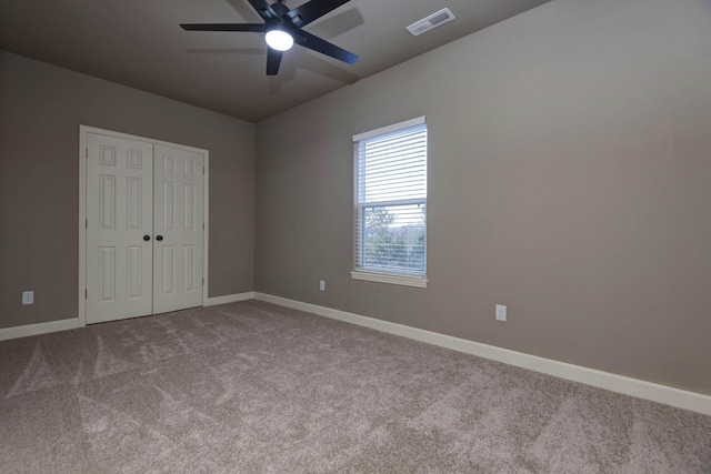 81 Clear Cove Dr, Reeds Spring, MO 65737 - unfurnished bedroom featuring carpet floors, baseboards, a closet, and a ceiling fan