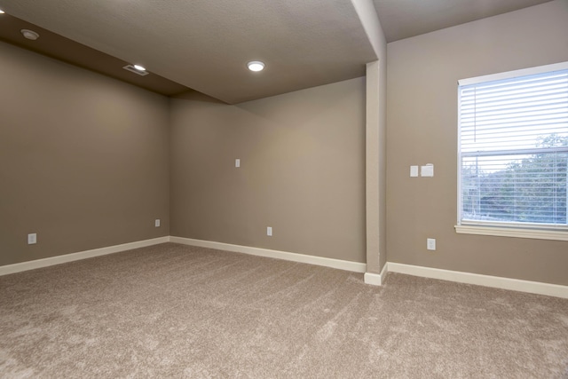81 Clear Cove Dr, Reeds Spring, MO 65737 - unfurnished room with carpet, healthy amount of natural light, baseboards, and recessed lighting