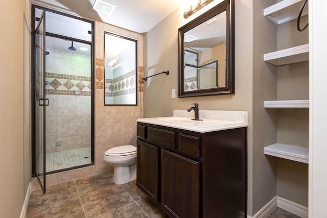81 Clear Cove Dr, Reeds Spring, MO 65737 - bathroom featuring vanity, a shower stall, and toilet
