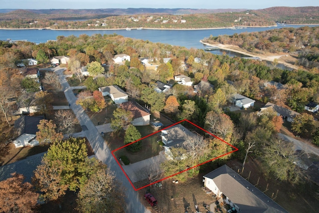 81 Clear Cove Dr, Reeds Spring, MO 65737 - aerial view of property and surrounding area with a nearby body of water and property boundaries highlighted