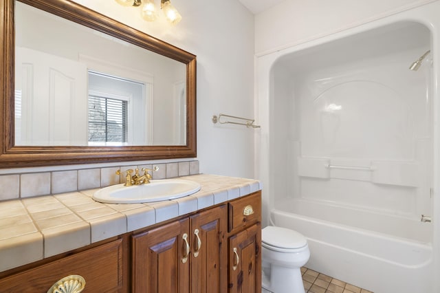 full bathroom with backsplash, toilet, tile patterned floors, shower / tub combination, and vanity