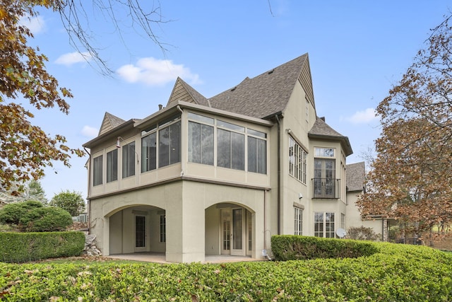 rear view of house featuring a patio area