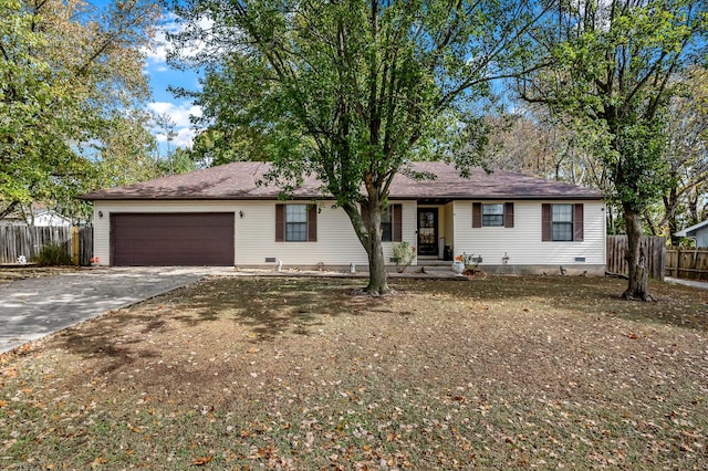 single story home featuring a garage