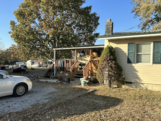 20600 Lawrence Unit 2200, Aurora, MO 65605 - view of home's exterior with a chimney and crawl space