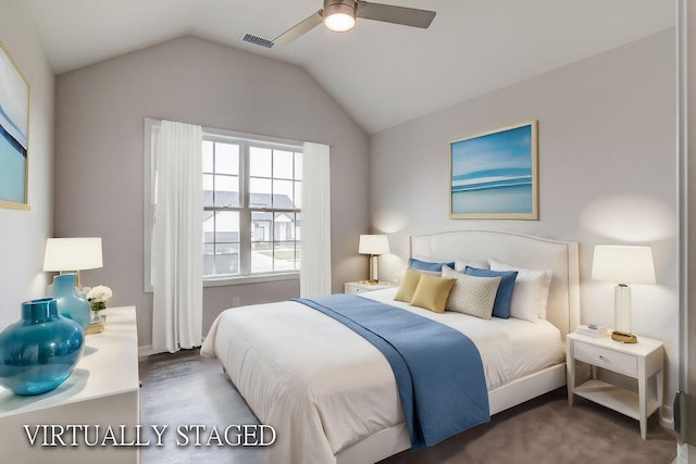 bedroom featuring ceiling fan and vaulted ceiling