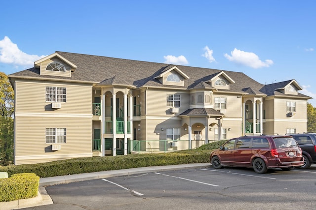 view of front of property featuring cooling unit