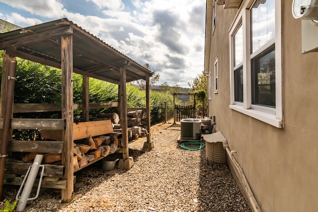 view of property exterior with cooling unit