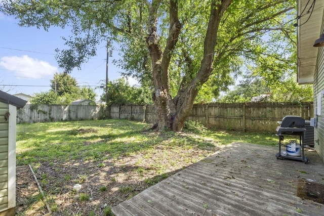 view of yard with a wooden deck