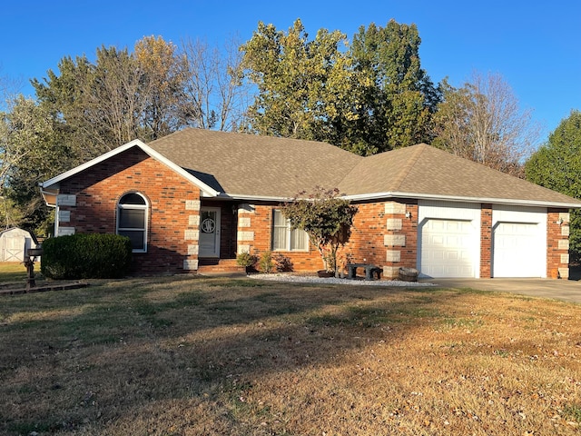 ranch-style house with a front yard and a garage