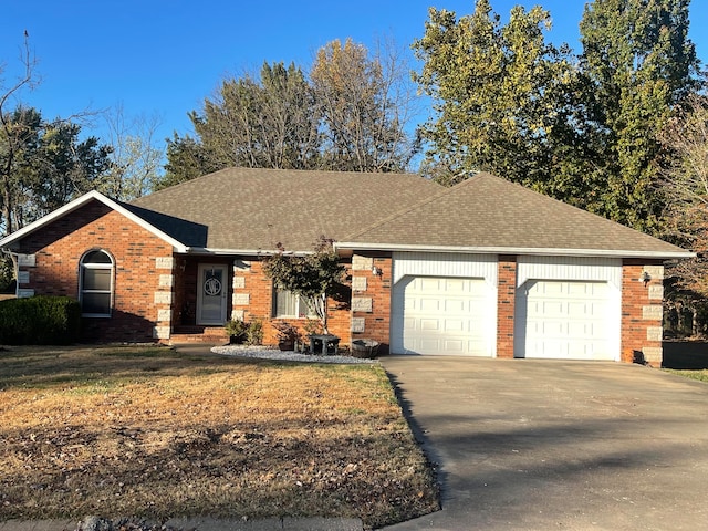 ranch-style home with a garage