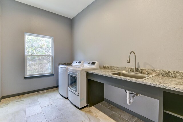 3133 Talking Rocks Rd, Reeds Spring, MO 65737 - washroom with washer and clothes dryer and baseboards