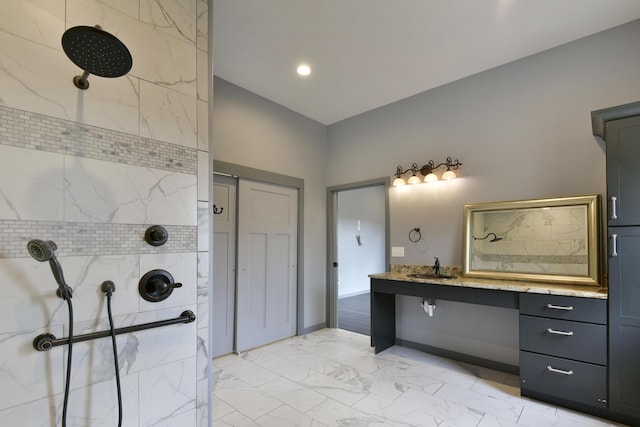 3133 Talking Rocks Rd, Reeds Spring, MO 65737 - bathroom featuring marble finish flooring, a tile shower, vanity, and recessed lighting