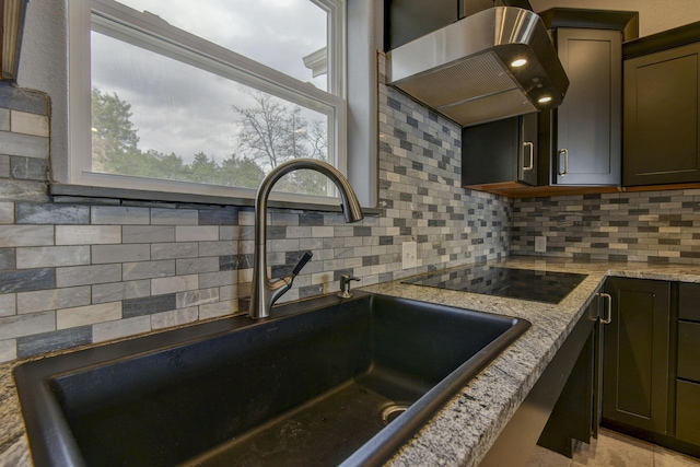 3133 Talking Rocks Rd, Reeds Spring, MO 65737 - kitchen with wall chimney exhaust hood, a sink, black electric stovetop, and tasteful backsplash