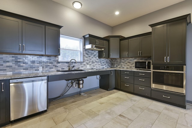 3133 Talking Rocks Rd, Reeds Spring, MO 65737 - kitchen featuring appliances with stainless steel finishes, a sink, backsplash, and light stone countertops