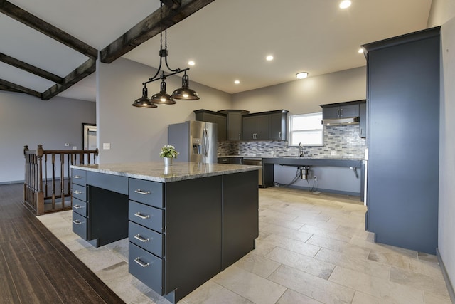 3133 Talking Rocks Rd, Reeds Spring, MO 65737 - kitchen featuring stainless steel refrigerator with ice dispenser, a kitchen island, tasteful backsplash, beamed ceiling, and under cabinet range hood