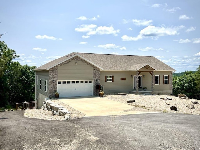 3133 Talking Rocks Rd, Reeds Spring, MO 65737 - ranch-style house with an attached garage and driveway