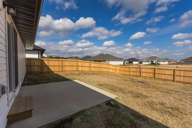 view of yard with a patio area