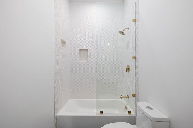 bathroom featuring toilet and bathtub / shower combination