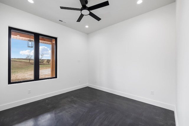 empty room featuring ceiling fan