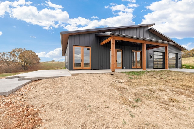 back of house with a patio